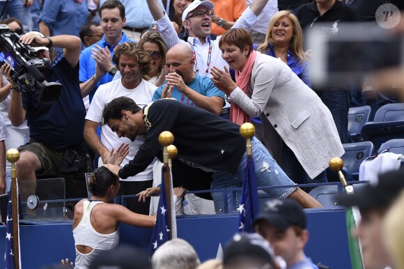 Flavia Pennetta et son compagon Fabio Fognini après sa finale victorieuse de l'US Open à l'USTA Billie Jean King National Tennis Center de Flushing dans le Queens à New York, le 12 septembre 2015