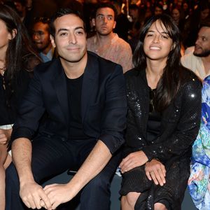Mohammed Al Turki et Michelle Rodriguez au premier rang du défilé Jeremy Scott printemps-été 2016 au Skylight at Moynihan Station. New York, le 14 septembre 2015.
