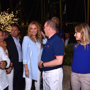 Le prince Albert II de Monaco participait le 10 septembre 2015, tout comme Adriana Karembeu et son mari André, à la soirée de remise des prix du Concours des Chefs dans le cadre de la 12e Monaco Classic Week au Yacht Club de Monaco.