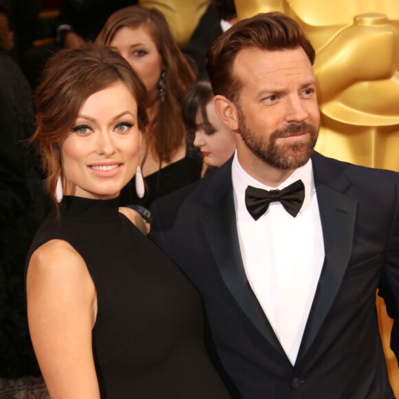 Olivia Wilde enceinte et son fiancé Jason Sudeikis - 86e cérémonie des Oscars à Hollywood, le 2 mars 2014.