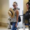 Exclusif - Kate Hudson et son fils Ryder arrivent à l'aéroport Tom Bradley à Los Angeles, pour prendre un vol international. Le 11 juin 2015