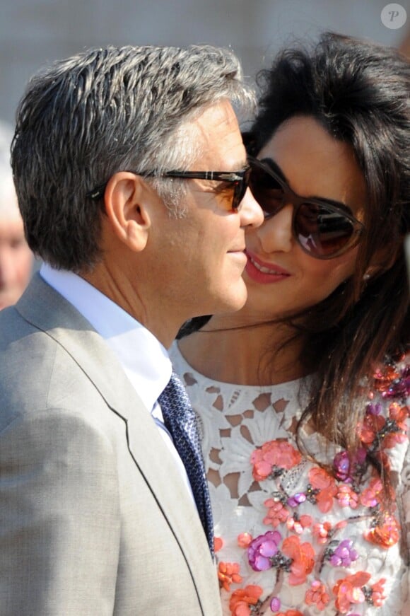 George Clooney et sa femme Amal Alamuddin quittent l'hôtel Aman, où ils ont passé leur nuit de noces à Venise le 28 septembre 2014.
