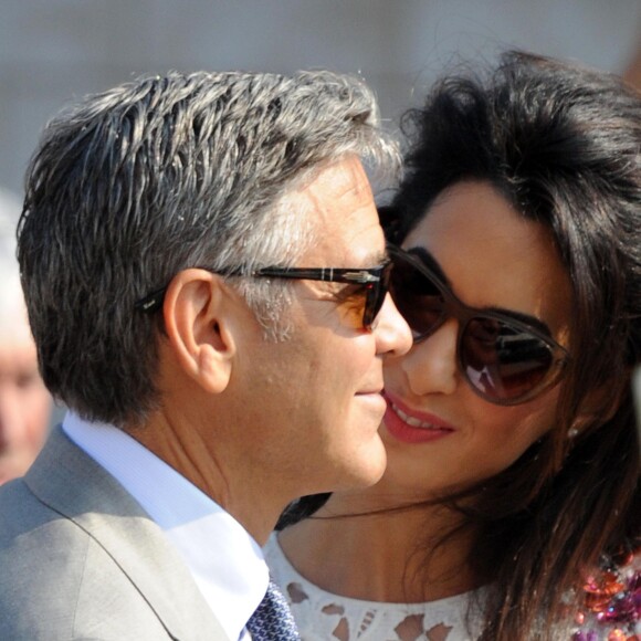 George Clooney et sa femme Amal Alamuddin quittent l'hôtel Aman, où ils ont passé leur nuit de noces à Venise le 28 septembre 2014.