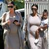 Kim Kardashian raffole de son trench-coat Haider Ackermann ! Un manteau gris transparent en mousseline de soie, qu'elle porte aussi bien avec son mari Kanye West que sa fille North et ses soeurs.