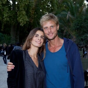 Arnaud Lemaire et une amie - Défilé Bonpoint à l'Orangerie du Jardin du Luxembourg à l'occasion des 40 ans de la marque le 3 octobre 2015 à Paris.