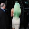 Kylie Jenner (les cheveux verts) et son petit-ami le rappeur Tyga sortent de l'hôtel Trump à New York, le 16 septembre 2015.