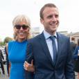 French Minister of the Economy, Industry and the Digital Sector Emmanuel Macron and his wife Brigitte Trogneux during the 2015 annual Bastille Day military parade on Place de la Concorde square in Paris, France on July 13, 2015. President Pena Nieto is on a three-day state visit to France. Photo by Thierry Orban/ABACAPRESS.COM14/07/2015 - Paris