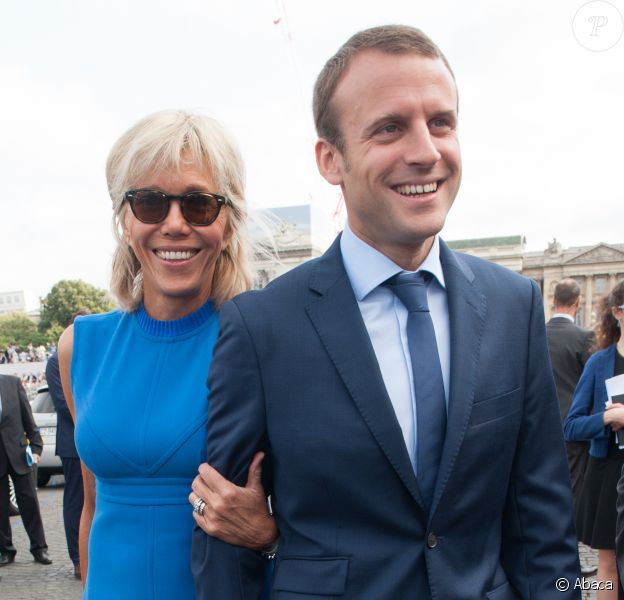 French Minister of the Economy, Industry and the Digital Sector Emmanuel Macron and his wife Brigitte Trogneux during the 2015 annual Bastille Day military parade on Place de la Concorde square in Paris, France on July 13, 2015. President Pena Nieto is on a three-day state visit to France. Photo by Thierry Orban/ABACAPRESS.COM14/07/2015 - Paris