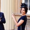Frank Lampard avec sa belle Christine Bleakley après avoir été fait Officier de l'ordre de l'Empire Britannique, à Buckingham Palace à Londres, le 27 octobre 2015