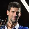 Novak Djokovic présente son trophée à la presse, aprés sa victoire en finale du BNP Paribas Masters face à Andy Murray à l'Accor Hotels Arena à Paris le 8 novembre 2015