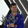 Novak Djokovic présente son trophée à la presse, aprés sa victoire en finale du BNP Paribas Masters face à Andy Murray à l'Accor Hotels Arena à Paris le 8 novembre 2015.