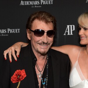 Exclusif - Johnny Hallyday et sa femme Laeticia Hallyday - La maison Audemars Piguet a célébré le lancement de la nouvelle Millenary Femme au Carreau du Temple à Paris le 6 juillet 2015 .