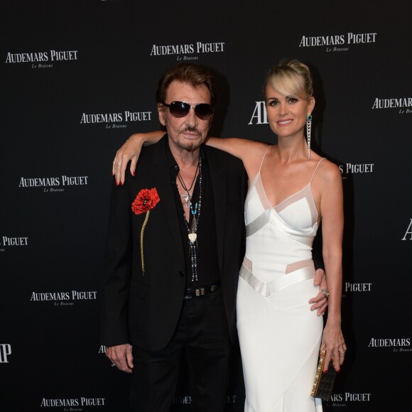 Exclusif - Johnny Hallyday et sa femme Laeticia Hallyday - La maison Audemars Piguet a célébré le lancement de la nouvelle Millenary Femme au Carreau du Temple à Paris le 6 juillet 2015 .