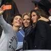 Alessandra Sublet, Sylvie Tellier, Malika Ménard et Flora Coquerel assistent au match de football entre la France et l'Allemagne au Stade de France à Saint-Denis le 13 novembre 2015.