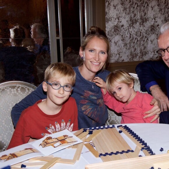 Exclusif - Alain Ducasse et sa femme Gwenaelle, accompagnés de leurs enfants Arzhel et Dae, au goûter organisé par le fondateur des Kapla au Plaza Athénée à Paris, le 8 novembre 2015.