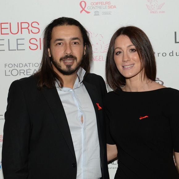 Archives - Moundir et sa femme Inès lors de l'opération " Coiffeurs Contre le Sida " édition 2014 à l'Académie L'Oréal Produits Professionnels à Paris, le 1er décembre 2014.