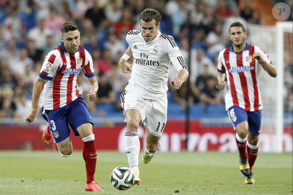 Gareth Bale et Guilherme Siqueira à Madrid, le 19 août 2014.
