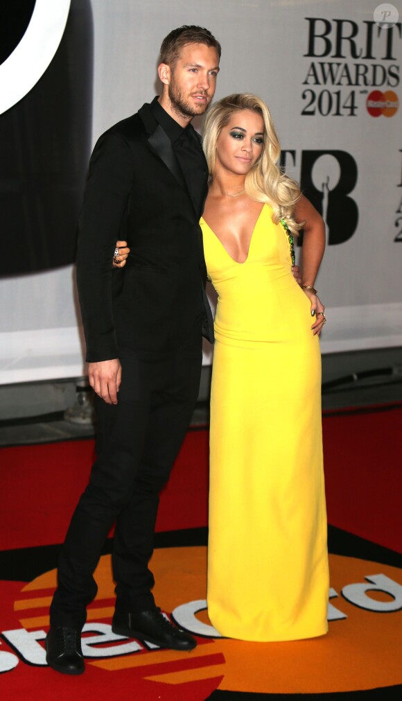 Rita Ora et son petit-ami Calvin Harris - Personnalités arrivant à la soirée des "Brit Awards 2014" en partenariat avec MasterCard à Londres, le 19 février 2014