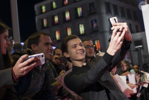 British actor Tom Holland takes a selfie photography with fans during `En el corazon del mar' (In the Heart of the Sea) film presentation in Madrid, Spain. December 03, 2015. Photo by Victor Blanco/AlterPhotos/ABACAPRESS.COM04/12/2015 - Madrid
