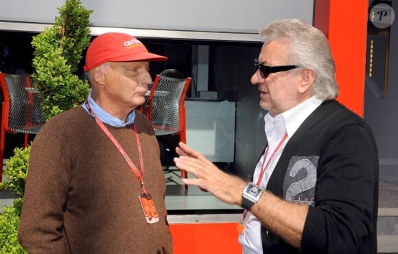 Niki Lauda et Willi Weber, ancien manager de Michael Schumacher, en 2008 au Grand Prix d'Espagne.