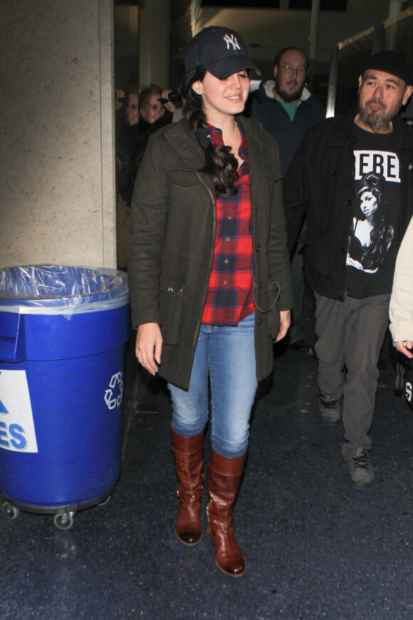 Lana Del Rey arrives in Los Angeles wearing plaid with denim and boots, Los Angeles, CA, USA on December 13, 2015. The singer makes the lumberjack garb look cute as she pairs it with a NY cap. Photo by GSI/ABACAPRESS.COM14/12/2015 - Los Angeles
