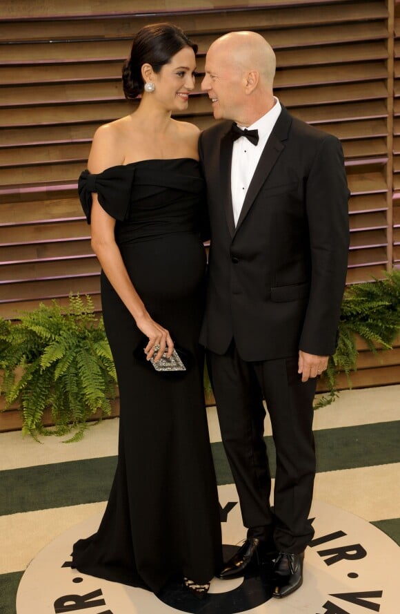 Bruce Willis et sa femme Emma Heming (enceinte) à la soirée Vanity fair après les Oscars 2014 à West Hollywood. Le 2 mars 2014