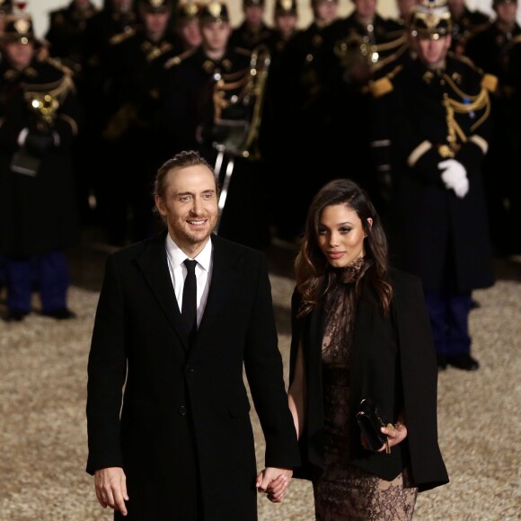 Le DJ David Guetta et sa compagne Jessica Ledon arrivent au dîner d'état donné en l'honneur du président cubain Raul Castro au palais de l'Elysée à Paris, le 1er février 2016. ©Stéphane Lemouton/Bestimage