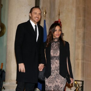 David Guetta et Jessica Ledon au dîner d'état donné en l'honneur du président cubain Raul Castro au palais de l'Elysée à Paris, le 1er février 2016. ©Dominique Jacovides/Bestimage