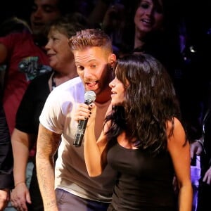 M. Pokora et Jenifer à Lyon, le 13 octobre 2012. 6e édition du foot-concert au profit de l'association Huntington Avenir qui lutte en faveur des malades et de leur famille.