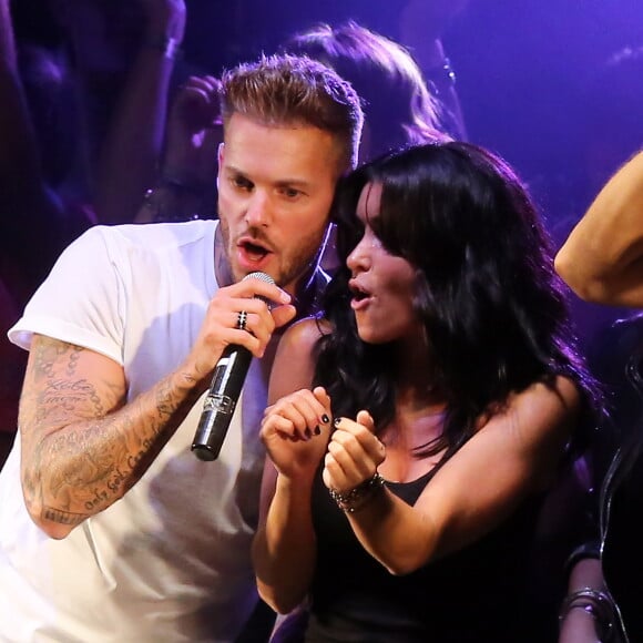 Les chanteurs M. Pokora et Jenifer à Lyon, le 13 octobre 2012. 6e édition du foot-concert au profit de l'association Huntington Avenir qui lutte en faveur des malades et de leur famille.