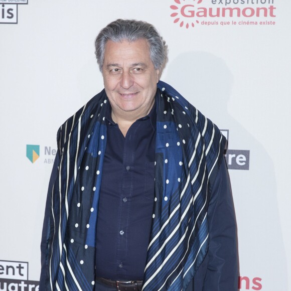 Christian Clavier - Photocall de l'exposition "120 ans de Cinéma: Depuis que le Cinéma existe" au 104 à Paris le 13 avril 2015.