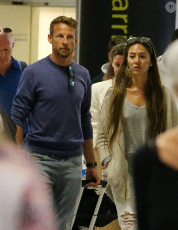 Jenson Button et Jessica Michibata à l'aéroport Gatwick à Londres le 10 août 2015. En décembre, le couple annonçait sa séparation.