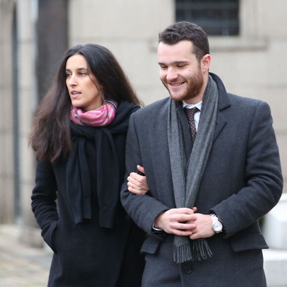 Semi-Exclusif - Louis Levy ( fils de Marc Levy) et Pauline Lévêque aux Obsèques de Raymond Levy (père de Marc Levy) au cimetière de Passy à Paris le 15 décembre 2014