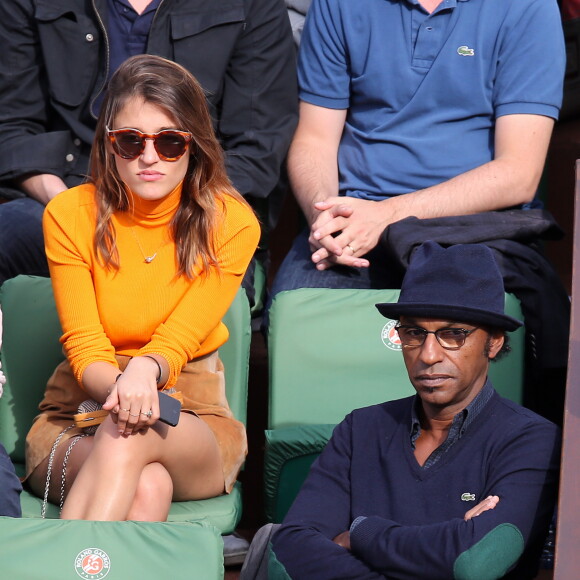 Lola Bessis, Manu Katché - People dans les tribunes des Internationaux de France de tennis de Roland Garros à Paris. Le 1er juin 2015.