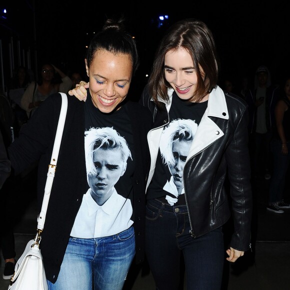 Lily Collins quitte le Staples Center à l'issue du concert de Justin Bieber. Los Angeles, le 21 mars 2016.