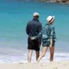 Semi-exclusif - Le chanteur Sting et sa femme Trudie Styler se promènent sur une plage de Saint-Barthélemy le 16 mars 2016.