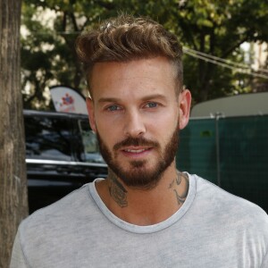 M. Pokora (Matt Pokora) lors de la Journée mondiale des oubliés des vacances de l'association du Secours populaire sur le Champ-de-Mars à Paris, le 19 août 2015