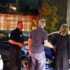Exclusif - George Clooney embrasse une inconnue sur le parking du restaurant Sushi Asanebo, à Los Angeles, le 16 mars 2016.
