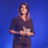 Karine Ferri (enceinte) anime le concert gratuit "RFM Music Live" à Lille. Le 28 septembre 2015