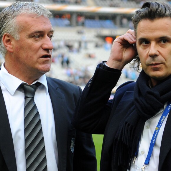 Olympique de Marseille's coach Didier Deschamps and Olympique de Marseille's chairman Vincent Labrune celebrate their victory after winning the French League Cup Final football match Lyon vs. Marseille at the Stade de France in Saint-Denis, north of Paris, on April 14, 2012. Marseille won 0-1. Photo by Christian Liewig/ABACAPRESS.COM15/04/2012 - Saint-Denis