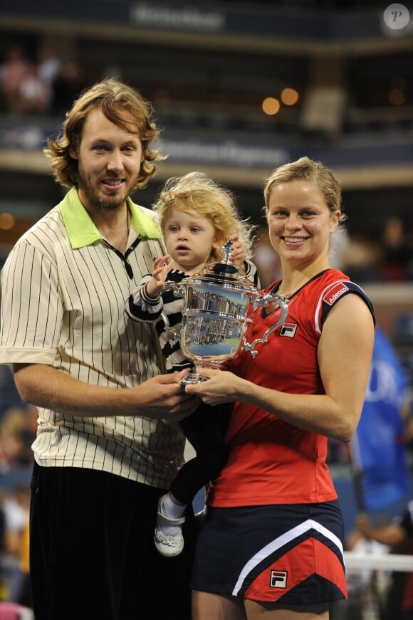 Kim Clijsters, son mari Brian Lynch et leur fille Jada après la finale de l'US Open à Flushing Meadows, le 13 septembre 2009