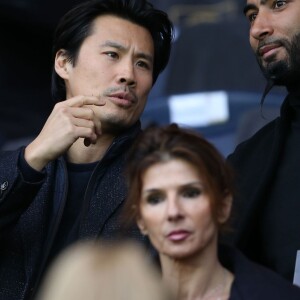 Frédéric Chau et La Fouine - People au match de football "PSG - Rennes" au Parc des Princes à Paris. Le 29 avril 2016 © Cyril Moreau / Bestimage