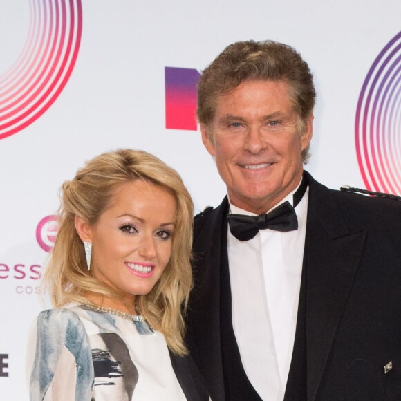 David Hasselhoff et Hayley Roberts posent au Photocall des MTV Europe Music Awards 2014 à "The Hydro" le 9 Novembre 2014 à Glasgow, Ecosse.