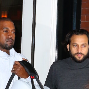 Kim Kardashian et Kanye West avec leur fils Saint West à New York le 1er mai 2016