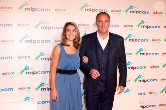Sophie Beliveau et Messmer - Photocall lors de la soirée du Mipcom à l'hôtel Martinez à Cannes, le 13 octobre 2014.
