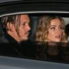 Johnny Depp et sa femme Amber Heard rentrent à leur hôtel après la première du film Black Mass à Londres, le 11 octobre 2015.