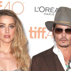 Johnny Depp (habillé en Ralph Lauren) et sa compagne Amber Heard (robe Elie Saab) - Première du film "The Danish Girl" au festival International du film de Toronto (TIFF) le 12 septembre 2015