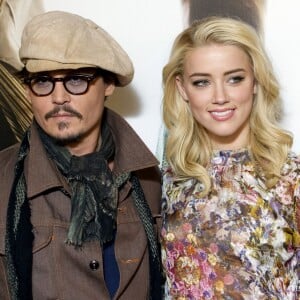 Johnny Depp et Amber Heard au photocall du film "Rhum Express" à Paris