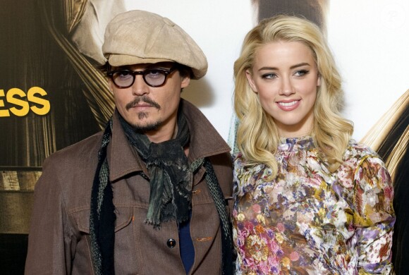 Johnny Depp et Amber Heard au photocall du film "Rhum Express" à Paris