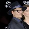 Johnny Depp et sa fiancée Amber Heard - Première du film "3 Days to Kill" à Hollywood, le 12 février 2014